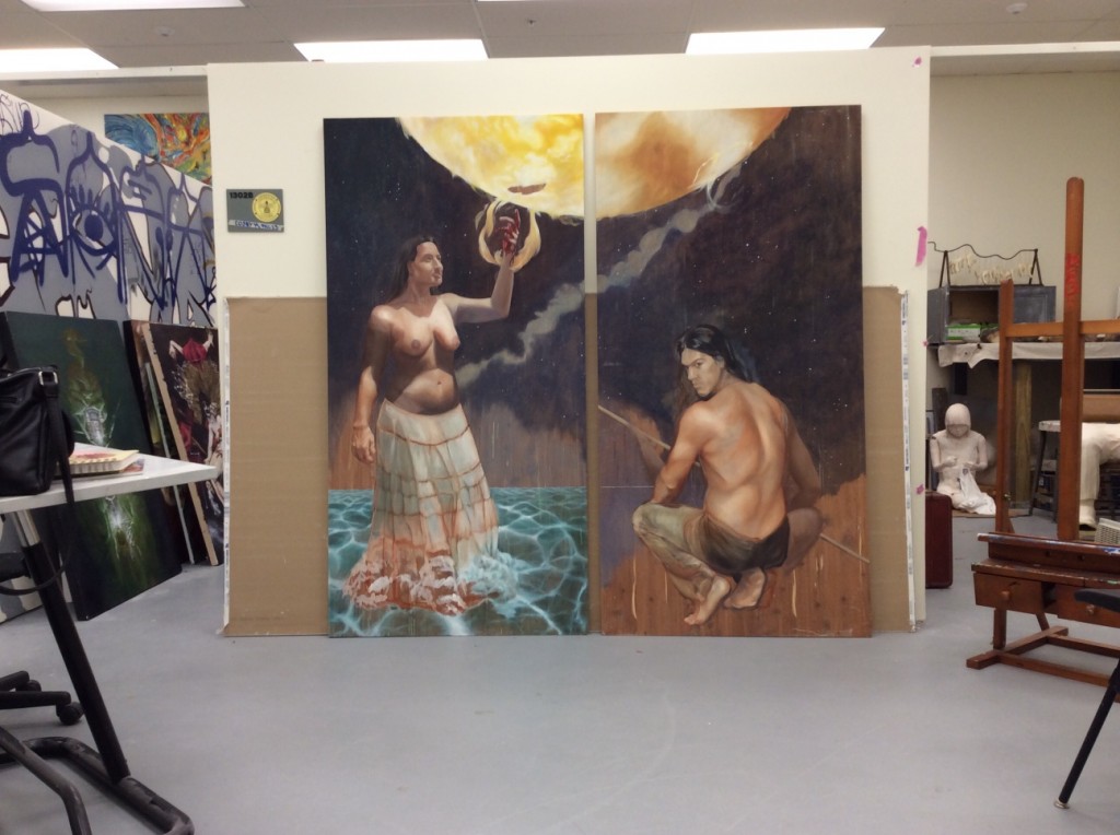 a studio space with a large painting in progress