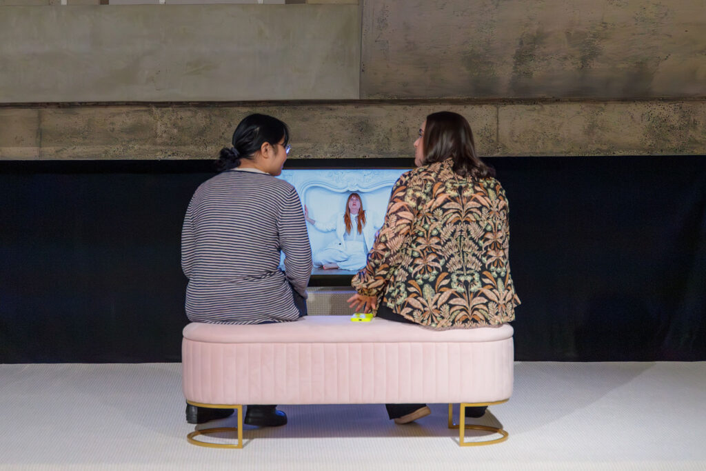 there are two people that are playing a video game together